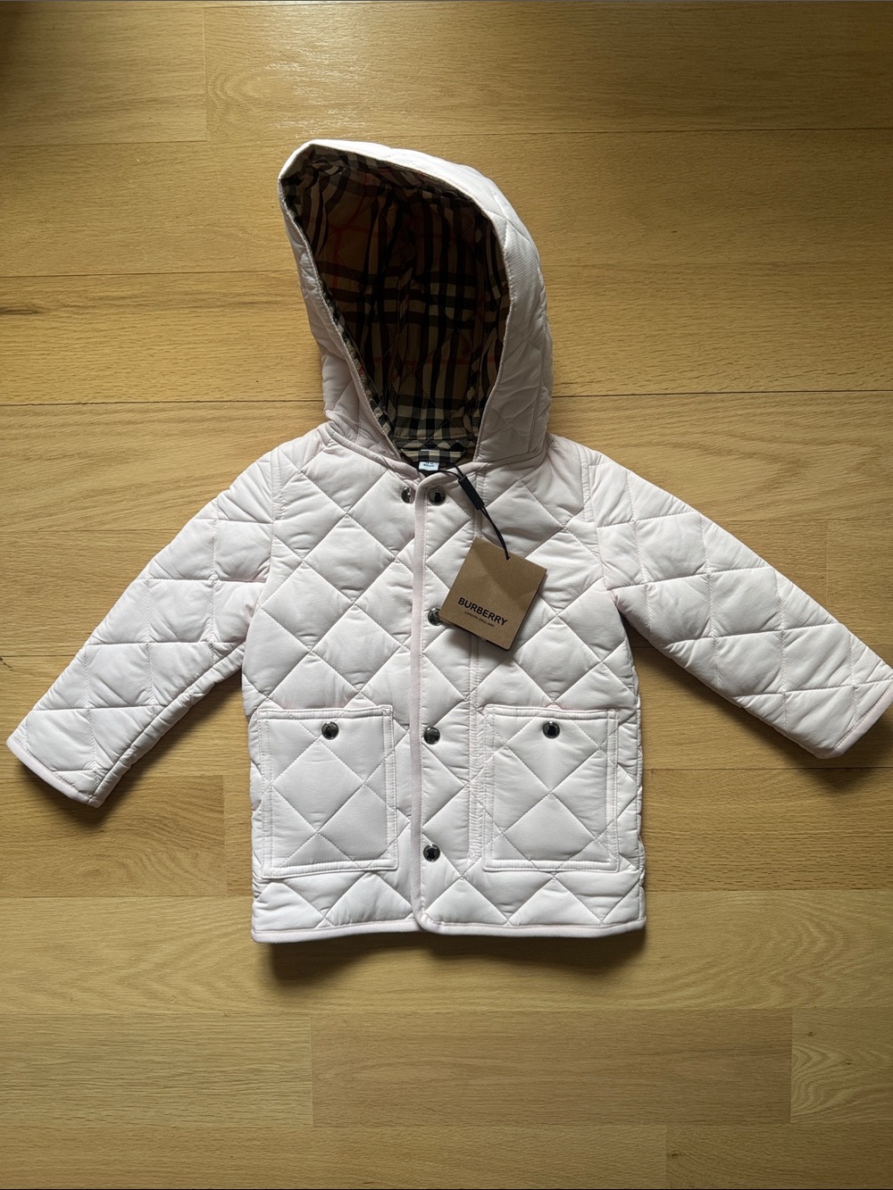 Burberry Baby Quilted Hooded Jacket in Pale Pink with Check Lining